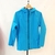 Campera rompeviento turquesa