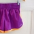 Short deportivo violeta en internet