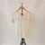 Remera con encaje beige