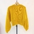 Sweater de lana amarrillo en internet