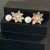 BRINCO DE FLOR COM PÉROLA na internet