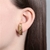 Brinco Ear Hook 4 Linhas - Banho de Ouro na internet