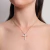 Colar Cruz com Zircônias Cristal - Banho de Ouro - comprar online