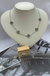 Pulseira elo cadeado com trevo cravejado