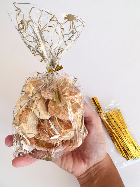 Bolsa transparente flores doradas. Pack por 10 unidades.