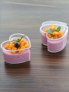 Envase transparente con forma de corazón. Incluye tapa + cuchara. Precio por unidad. - Capkelitos mayorista