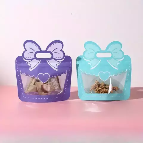 Bolsa doypack valijita con moño varios colores. Precio por unidad.