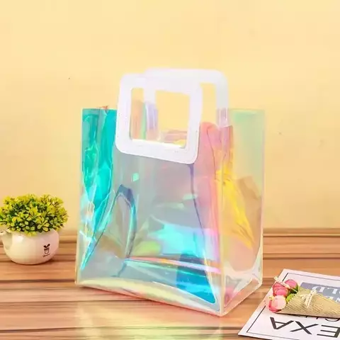 Bolsa de pvc holográfica con manija de cuerina. Precio por unidad - comprar online
