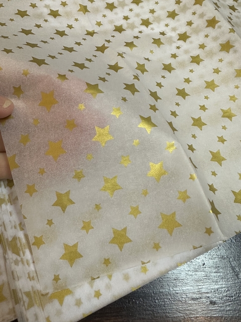 Papel seda con estrellas doradas. Pack por 2 unidades.