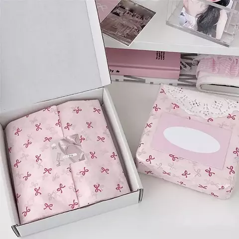 Papel seda con moñitos. Pack por 2 unidades