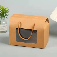 Caja maletín. 2 tamaños en kraft o blanco. Precio por unidad. en internet
