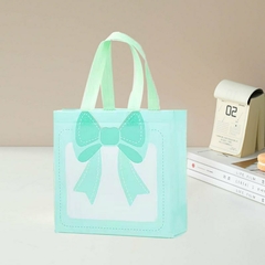 Bolsa de friselina con estampa moño. Precio por unidad. - tienda online