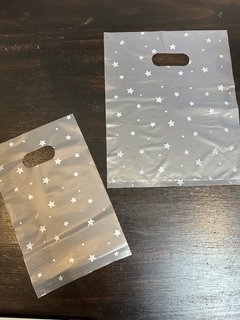 Bolsa riñón translúcida con estrellas blancas. 2 tamaños. Precio por unidad. - comprar online