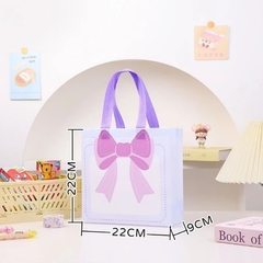 Bolsa de friselina con estampa moño. Precio por unidad. - Capkelitos mayorista