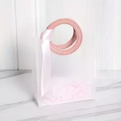 Bolsa de pvc con manija de cuerina. 2 tamaños y 2 colores diferentes. Precio por unidad