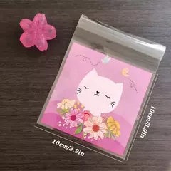 Bolsa opp "gatito blanco y flores" 10x10 cms. Pack por 10 unidades. - Capkelitos mayorista