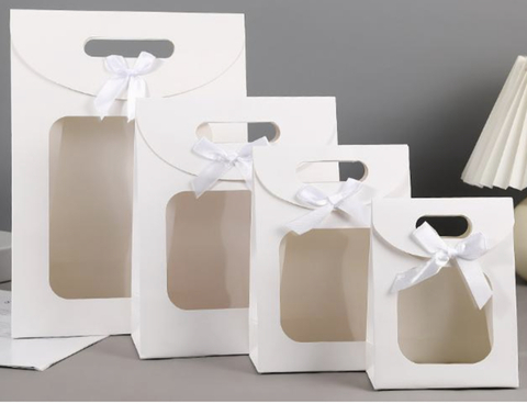 Bolsa blanca con visor. 4 tamaños disponibles. Precio x unidad. - comprar online