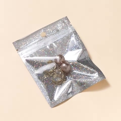 Bolsa con cierre hermético "glitter holográfico". Varios tamaños. Precio por unidad. - Capkelitos mayorista