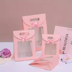 Bolsa rosa con visor. 4 tamaños disponibles. Precio x unidad. - Capkelitos mayorista