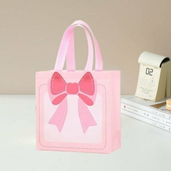 Imagen de Bolsa de friselina con estampa moño. Precio por unidad.