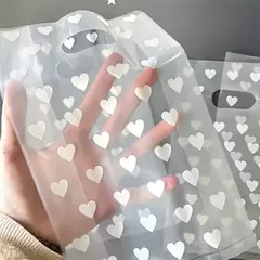 Bolsa riñón con fuelle lateral translúcida con corazones. Precio por unidad. - comprar online
