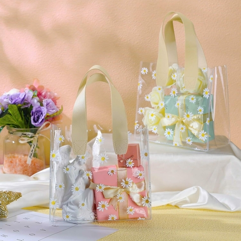 Bolsa pvc cristal con margaritas y manija de cuerina. Precio x unidad. - comprar online
