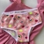 calcinha infantil rosa arco íris na internet