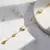 Joia de Concha com Flor de Quatro Trevos – Beleza Natural e Elegância Única - FutureStyle