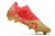 Chuteira Puma Future Z 1.3 Teazer FG - Dourado/Vermelho