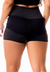 Short fitness preto com detalhe em tela e elástico branco na cintura alta, ideal para atividades físicas.