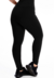 Calça legging preta lisa com detalhe no cós, ideal para atividades fitness.