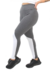 Calça legging fitness mescla com detalhes em branco, modelo ajustado, usada com tênis preto.