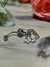 Piercing corazon y mariposas