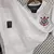 Camisa Corinthians 2010 Home Nike Retrô Branca com patrocínios Neo Química e Bozzano. Modelo clássico usado pelo Timão, ideal para torcedores e colecionadores apaixonados pelo futebol brasileiro