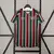 Camisa Fluminense Home 24/25 Umbro Masculino Verde e Vermelho com patrocínios Betano e Zinzane. Modelo histórico do Fluminense, ideal para torcedores e colecionadores apaixonados por futebol e grandes conquistas.