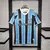 Camisa Grêmio Home 24/25 Umbro Masculina Azul e Preto com patrocínios Banrisul e KTO. Modelo histórico do Grêmio, ideal para torcedores e colecionadores apaixonados por futebol e grandes conquistas.
