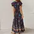 Vestido Maxi Feminino com Decote em V - Estampa Floral Boêmia na internet
