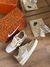 Tênis Air Force 1 Gold na internet