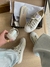 All Star Baixo PU Areia com Detalhes Lilás na internet
