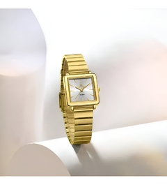 Reloj clásico dorado ✨