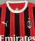 Camisa AC Milan I 24/25 - Torcedor Puma Masculina - Vermelha e preta com detalhes em branco - Goat Imports