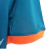 Camisa Chelsea Treino 22/23 - Torcedor Nike Masculina - Azul com detalhes em laranja e preto