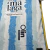 Camisa Málaga I 24/25 - Torcedor Hummel Masculina - Branca com detalhes em azul