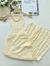 Vestido Tricô Longo Quadradinhos – Sofisticação e Conforto em uma Peça Atemporal na internet