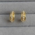 BRINCO MEIA ARGOLA COM ZIRCONIA