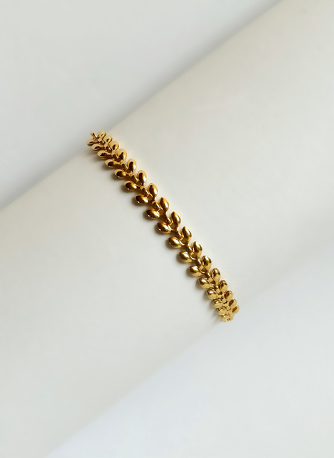 Pulseira dourada escamas