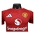 Camisa vermelha do Manchester United, modelo I 24/25 para jogadores, com logo da Adidas e patrocinador Snapdragon.