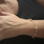 Pulseira Golden Sisters Rosé Encanto – Pedra Branca e Design Oval