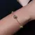 PULSEIRA DE ESFERAS DOURADAS - comprar online