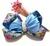 Presilha Bico de Pato Prateado Laço Cetim Azul Floral 14cm